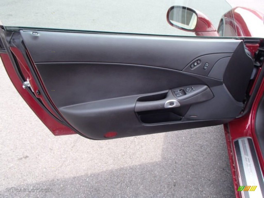2007 Chevrolet Corvette Coupe Ebony Door Panel Photo #83019094
