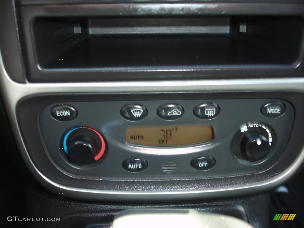 2003 L Series L300 Sedan - Black / Black photo #13