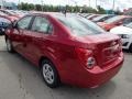 Crystal Red Tintcoat - Sonic LS Sedan Photo No. 6