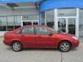 2000 Autumn Orange Metallic Ford Focus SE Sedan  photo #2