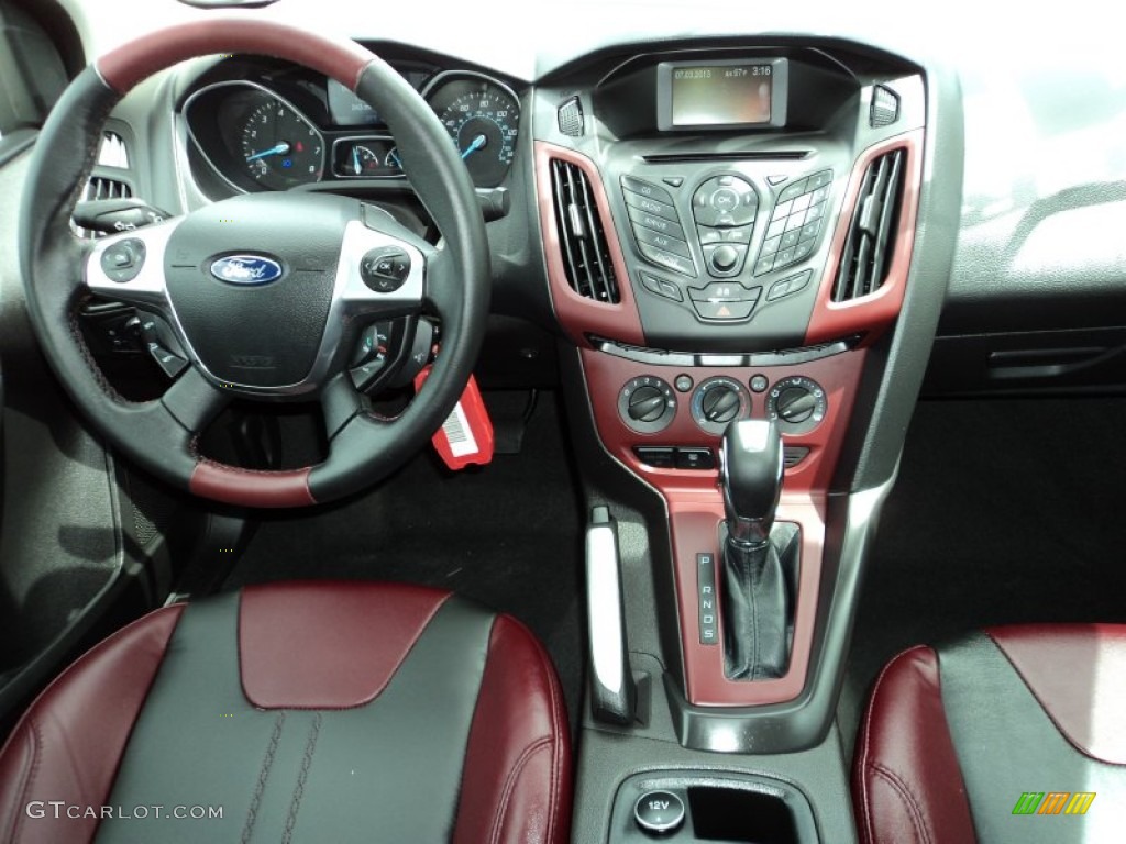 2013 Ford Focus SE Sedan Tuscany Red Dashboard Photo #83096185