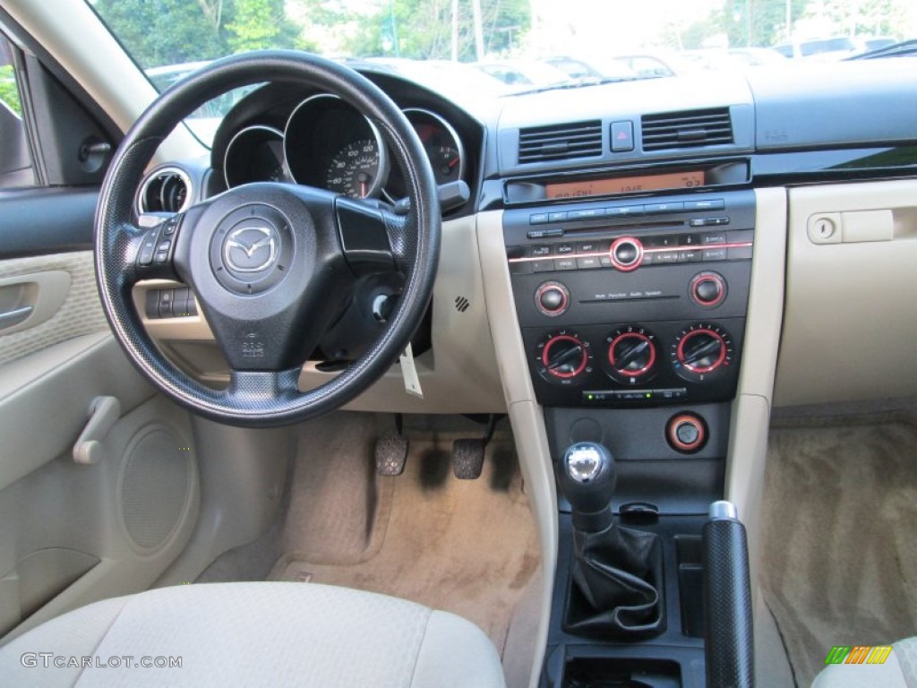 2006 Mazda MAZDA3 i Sedan Beige Dashboard Photo #83123338