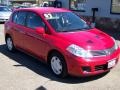 2007 Red Alert Nissan Versa S  photo #1