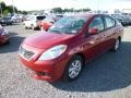 2013 Red Brick Nissan Versa 1.6 SL Sedan  photo #3