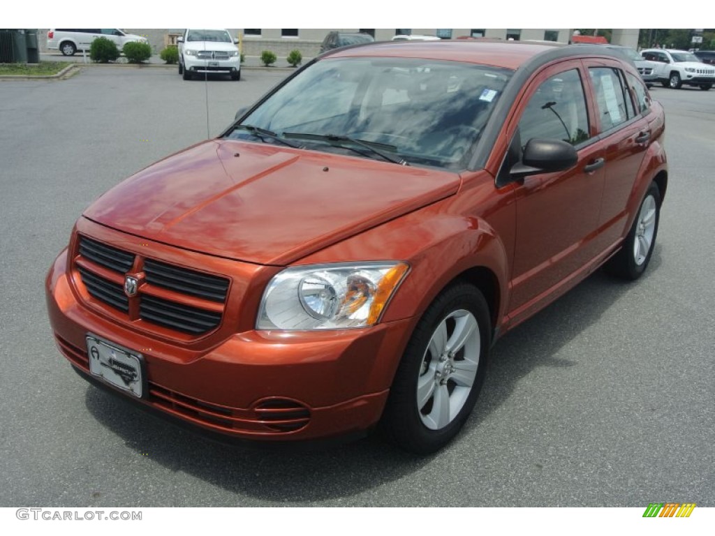 2009 Caliber SE - Sunburst Orange Pearl / Dark Slate Gray photo #1