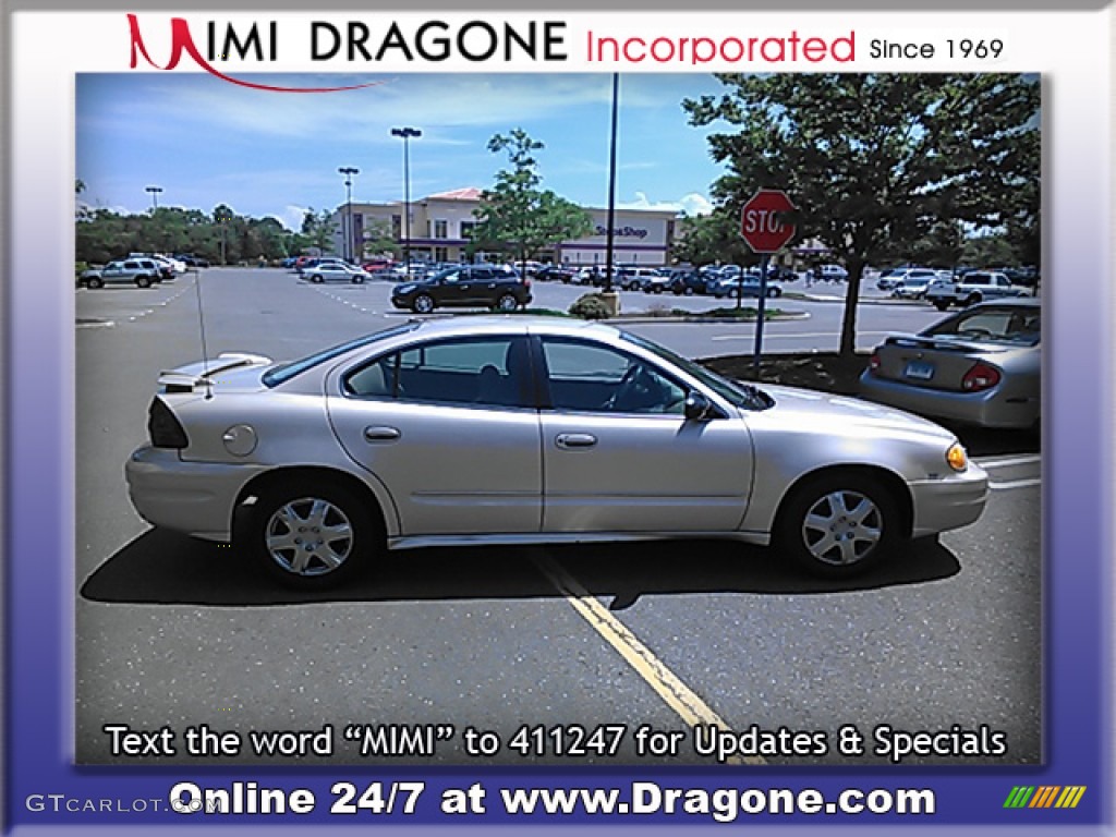 2005 Grand Am SE Sedan - Champagne Beige Metallic / Dark Taupe photo #7