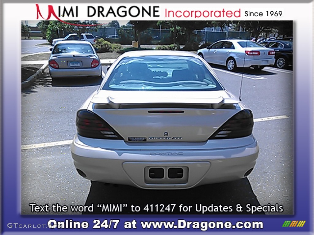 2005 Grand Am SE Sedan - Champagne Beige Metallic / Dark Taupe photo #9
