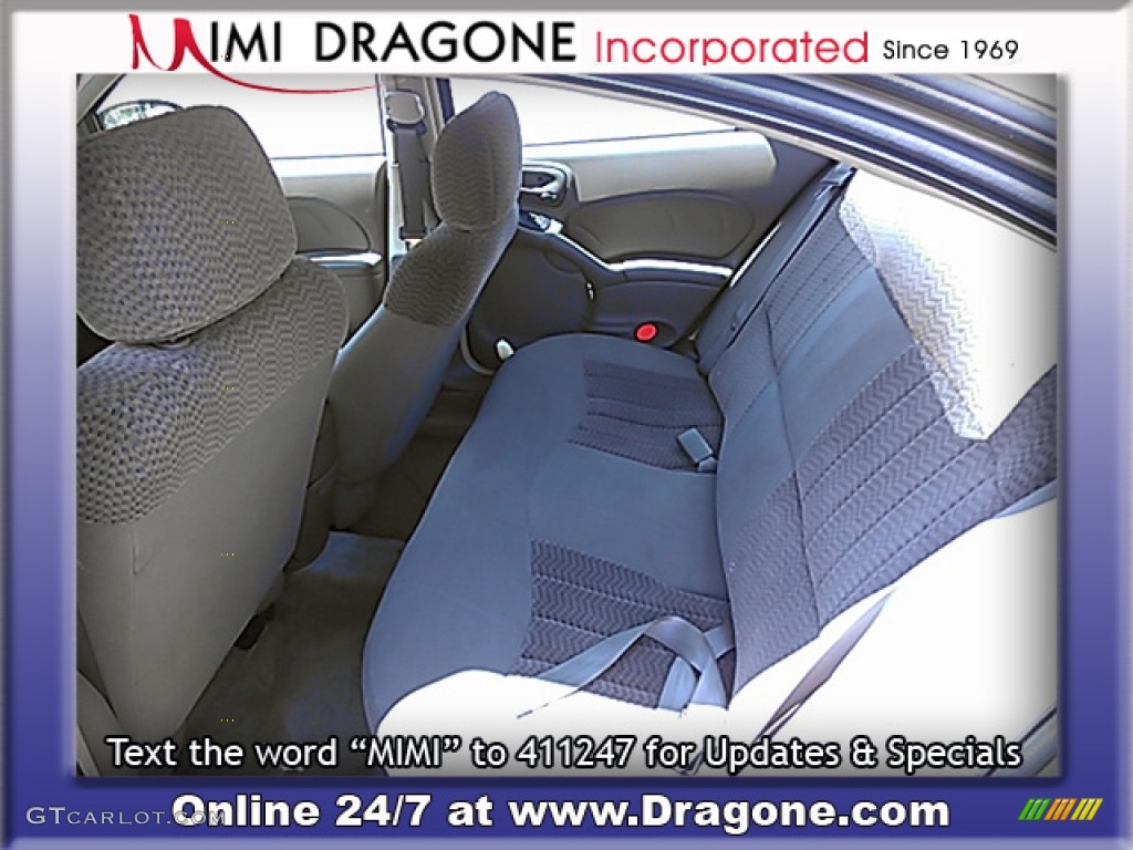 2005 Grand Am SE Sedan - Champagne Beige Metallic / Dark Taupe photo #16