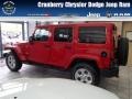 2013 Flame Red Jeep Wrangler Unlimited Sahara 4x4  photo #1