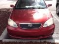 2006 Impulse Red Pearl Toyota Corolla LE  photo #1