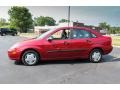 2003 Sangria Red Metallic Ford Focus LX Sedan  photo #3