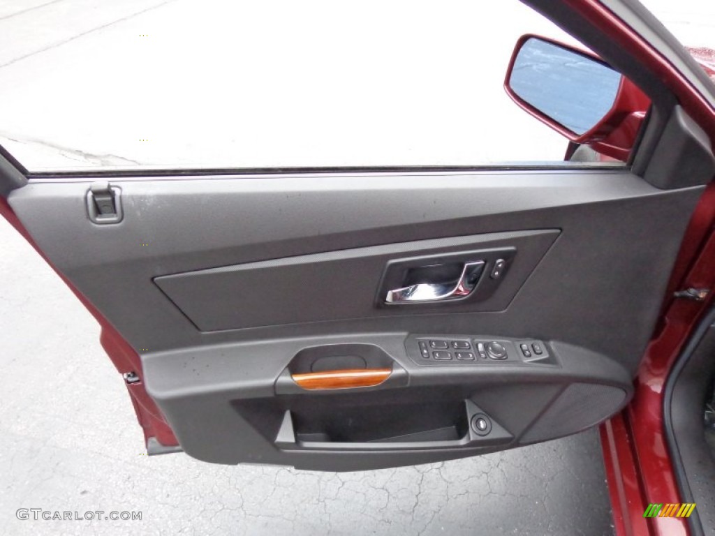 2003 Cadillac CTS Sedan Ebony Door Panel Photo #83275529