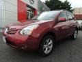 2010 Venom Red Nissan Rogue SL AWD  photo #1