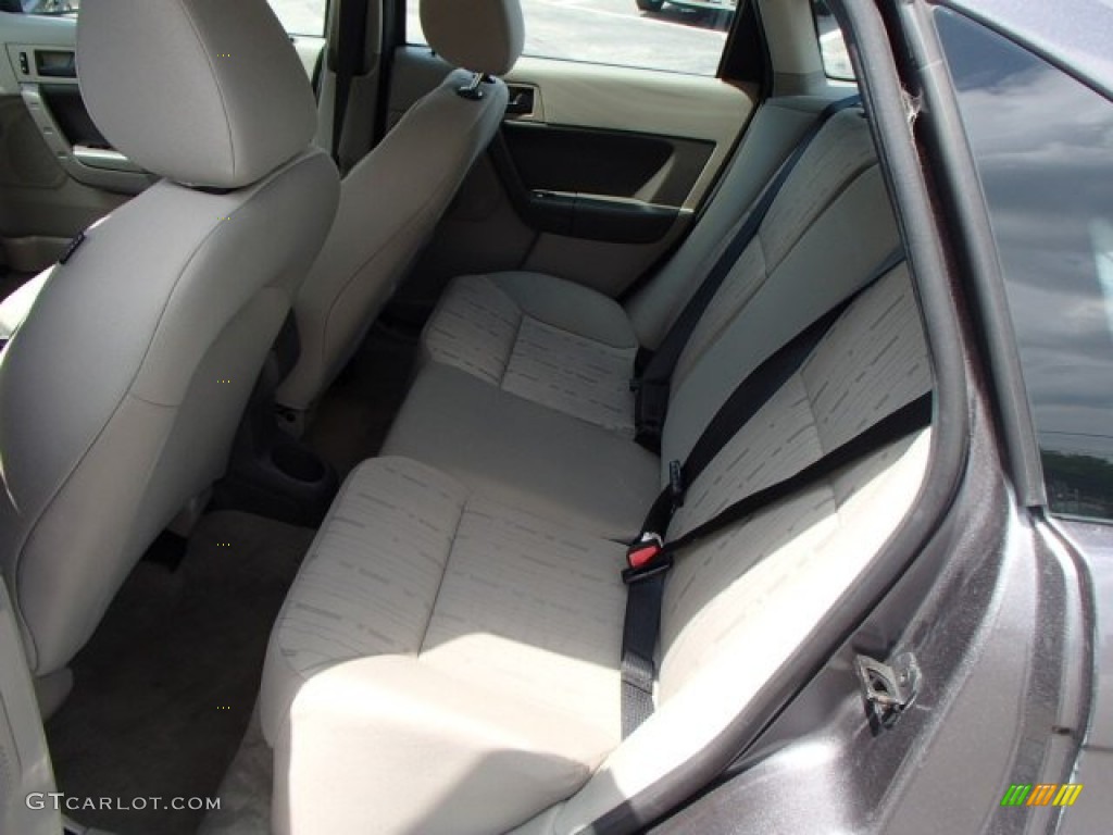 2011 Focus SE Sedan - Sterling Gray Metallic / Medium Stone photo #12