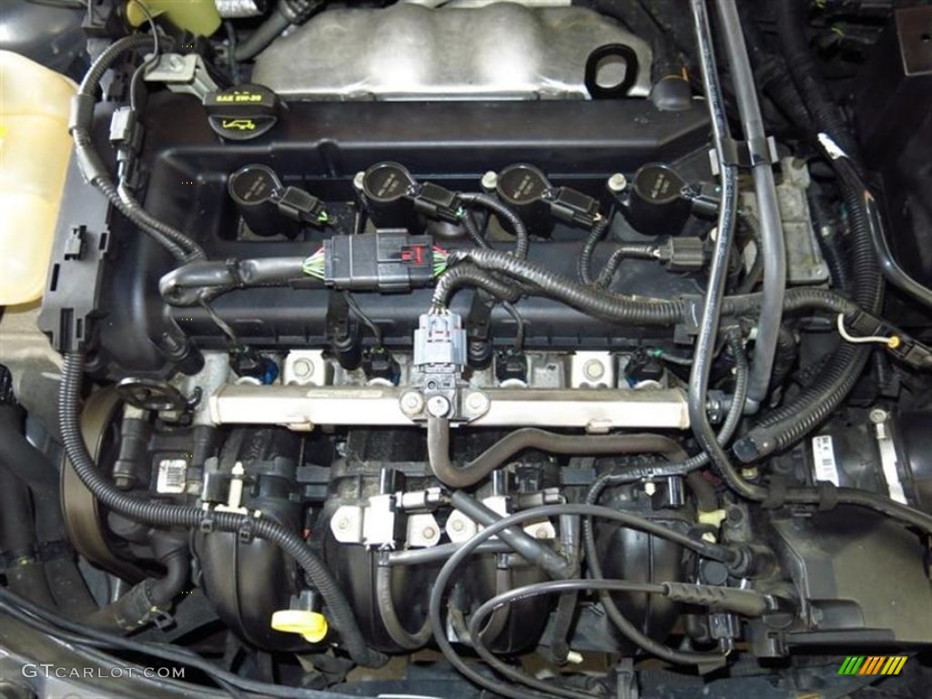 2005 Focus ZX4 ST Sedan - Liquid Grey Metallic / Charcoal/Red photo #5