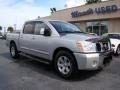 2006 Radiant Silver Nissan Titan LE Crew Cab  photo #2