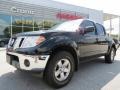 2010 Super Black Nissan Frontier LE Crew Cab 4x4  photo #1