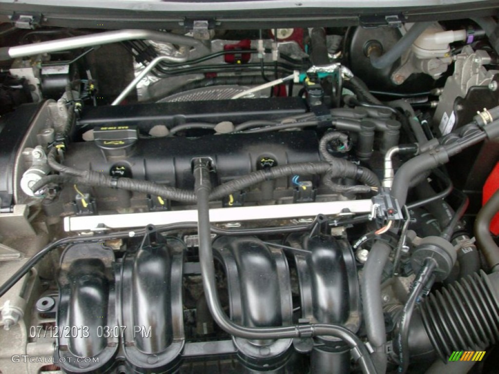 2011 Fiesta SE Sedan - Bright Magenta Metallic / Light Stone/Charcoal Black Cloth photo #11