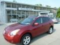 2009 Venom Red Nissan Rogue SL AWD  photo #1