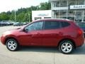 2009 Venom Red Nissan Rogue SL AWD  photo #2