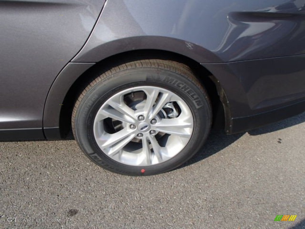 2014 Ford Taurus SEL Wheel Photo #83574102