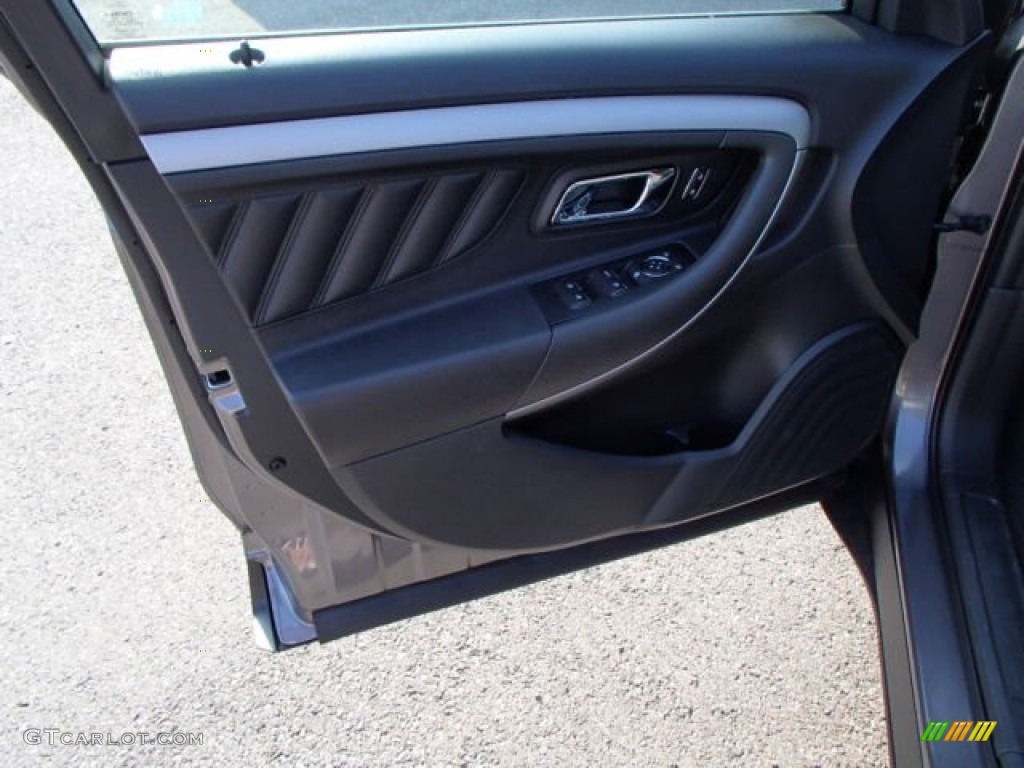 2014 Ford Taurus SEL Charcoal Black Door Panel Photo #83574154