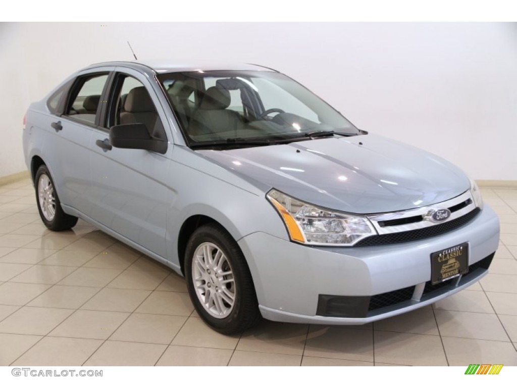2009 Focus SE Sedan - Light Ice Blue Metallic / Medium Stone photo #1