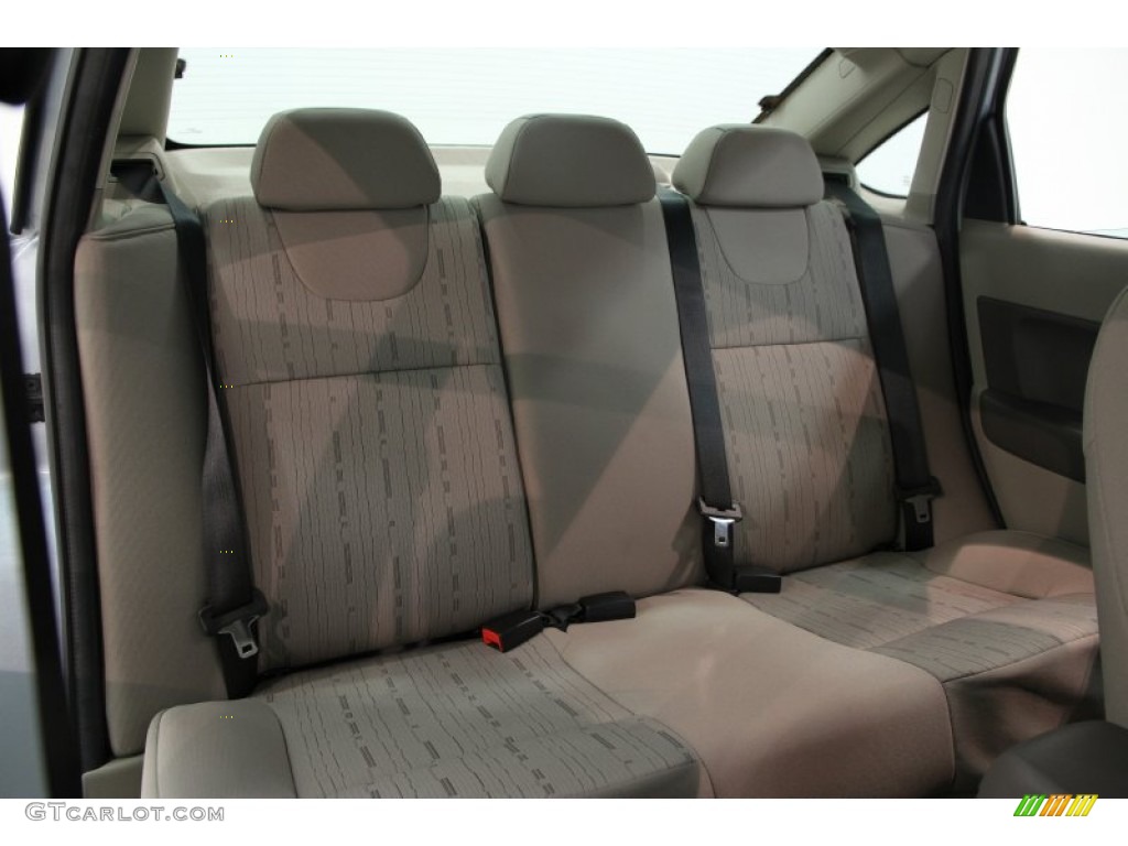 2009 Focus SE Sedan - Light Ice Blue Metallic / Medium Stone photo #13