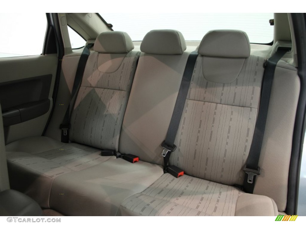2009 Focus SE Sedan - Light Ice Blue Metallic / Medium Stone photo #14