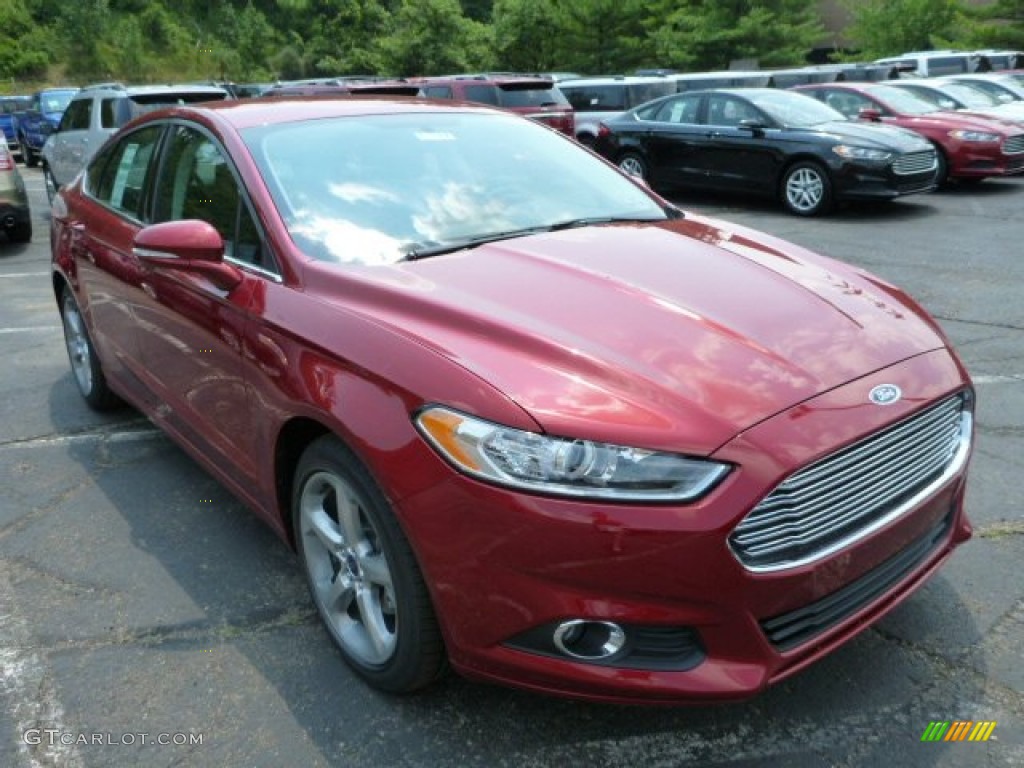 2013 Fusion SE 1.6 EcoBoost - Ruby Red Metallic / SE Appearance Package Charcoal Black/Red Stitching photo #1