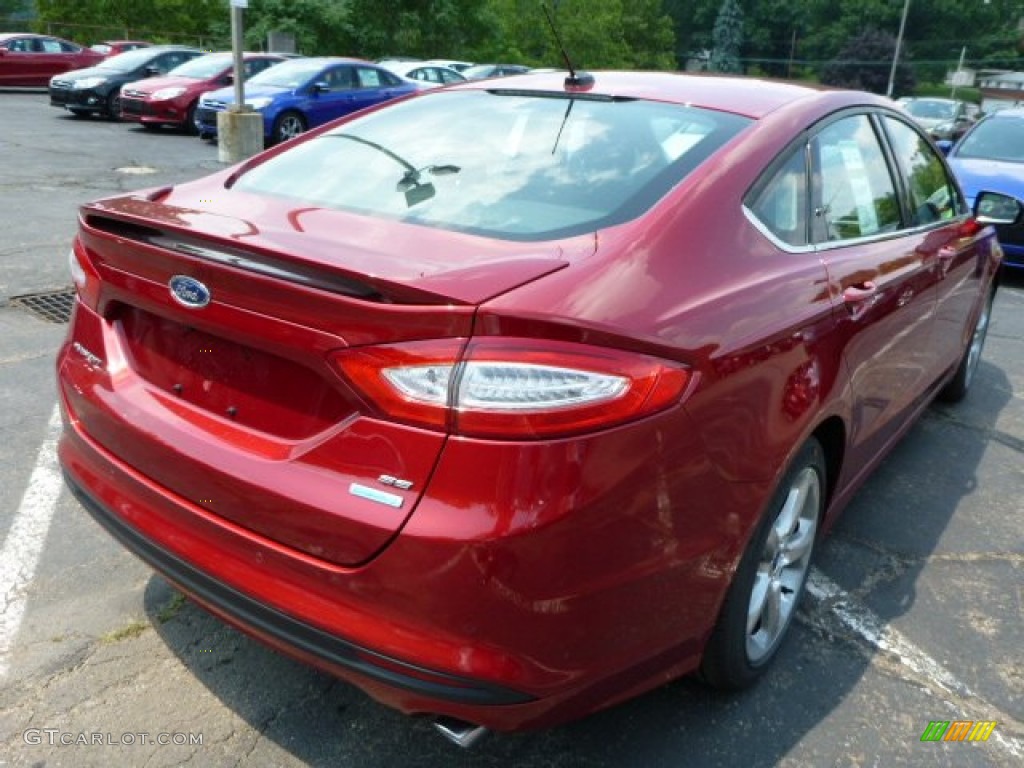 2013 Fusion SE 1.6 EcoBoost - Ruby Red Metallic / SE Appearance Package Charcoal Black/Red Stitching photo #2