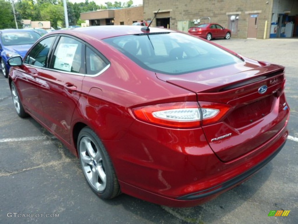 2013 Fusion SE 1.6 EcoBoost - Ruby Red Metallic / SE Appearance Package Charcoal Black/Red Stitching photo #4