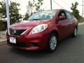 Red Brick 2012 Nissan Versa 1.6 SV Sedan