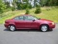 2004 Sport Red Metallic Pontiac Grand Am SE Sedan  photo #8