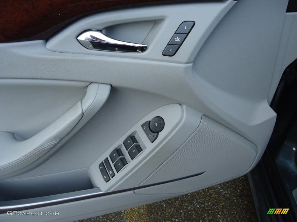 2010 Cadillac CTS 3.0 Sedan Light Titanium/Ebony Door Panel Photo #83659941