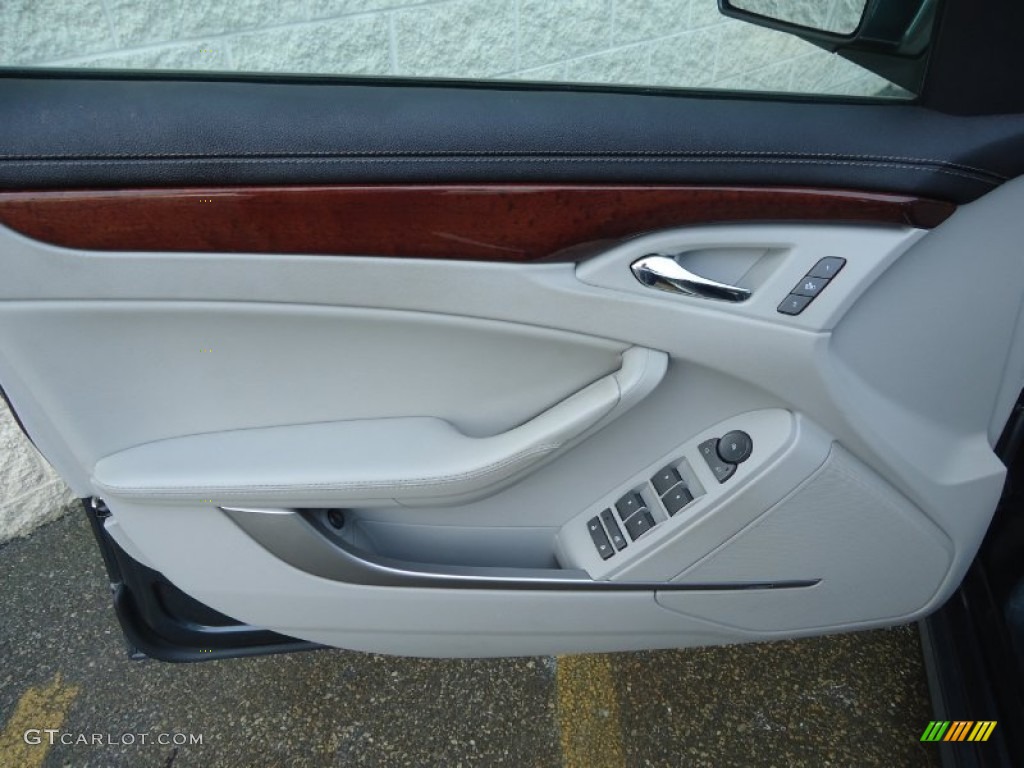 2010 Cadillac CTS 3.0 Sedan Light Titanium/Ebony Door Panel Photo #83660317