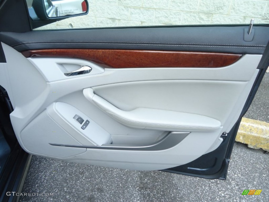 2010 Cadillac CTS 3.0 Sedan Light Titanium/Ebony Door Panel Photo #83660356