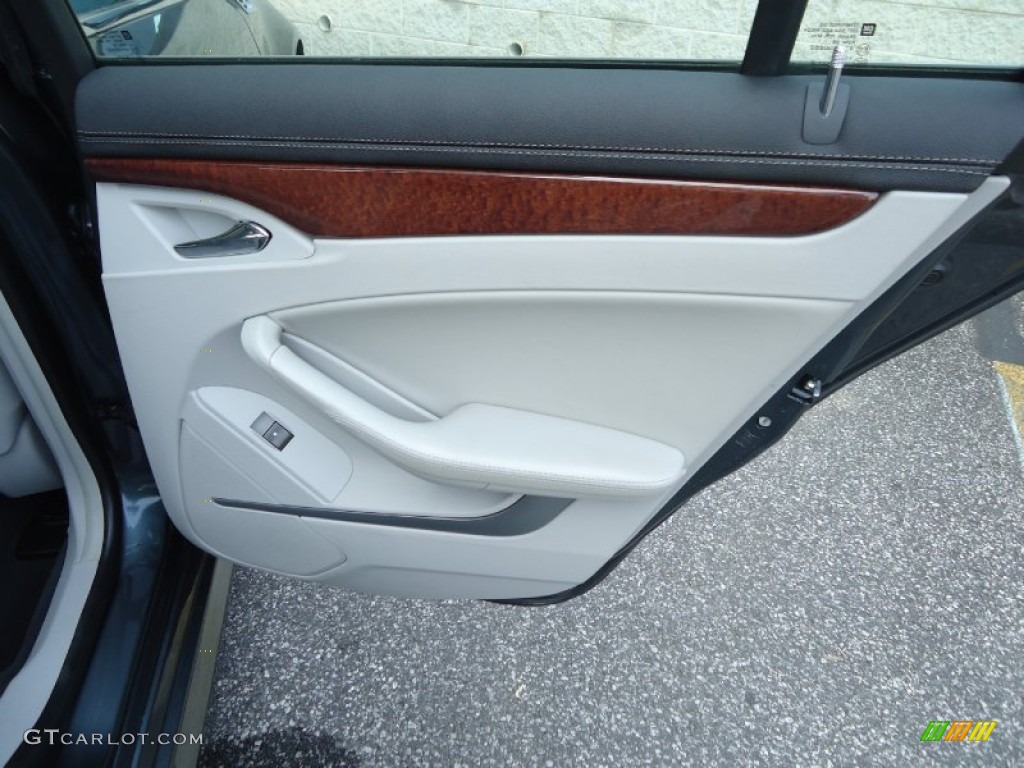 2010 Cadillac CTS 3.0 Sedan Light Titanium/Ebony Door Panel Photo #83660380