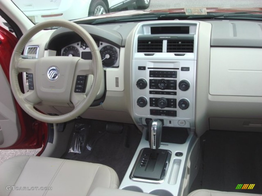 2010 Mariner V6 Premier 4WD - Sangria Red Metallic / Stone photo #13