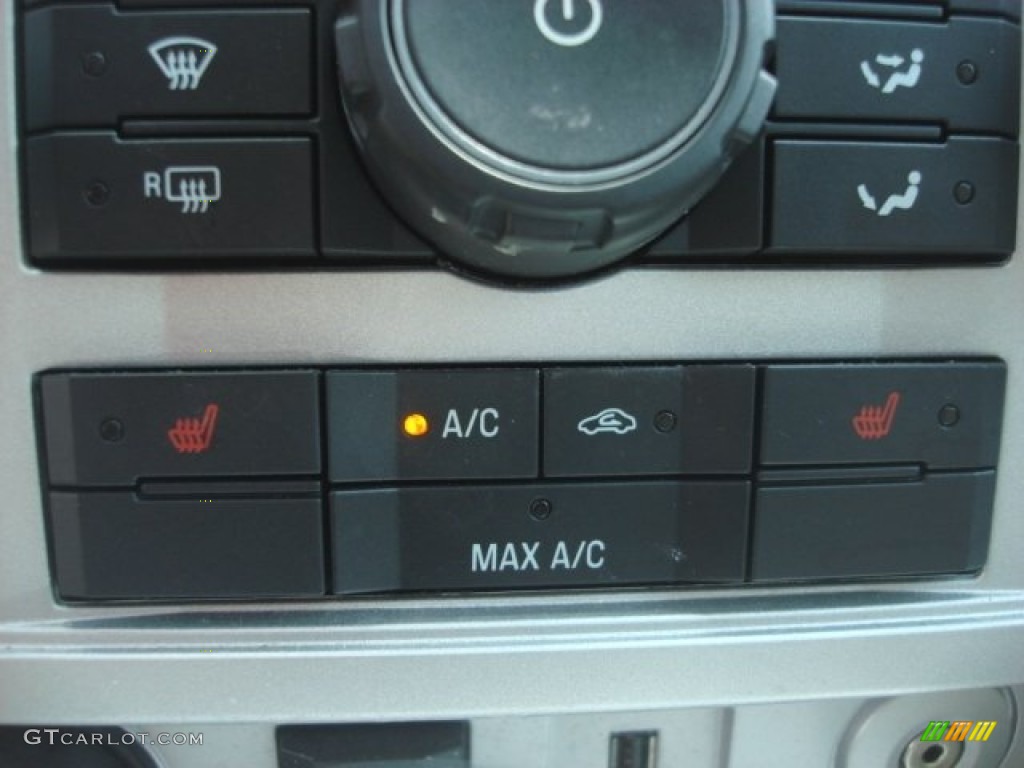 2010 Mariner V6 Premier 4WD - Sangria Red Metallic / Stone photo #18