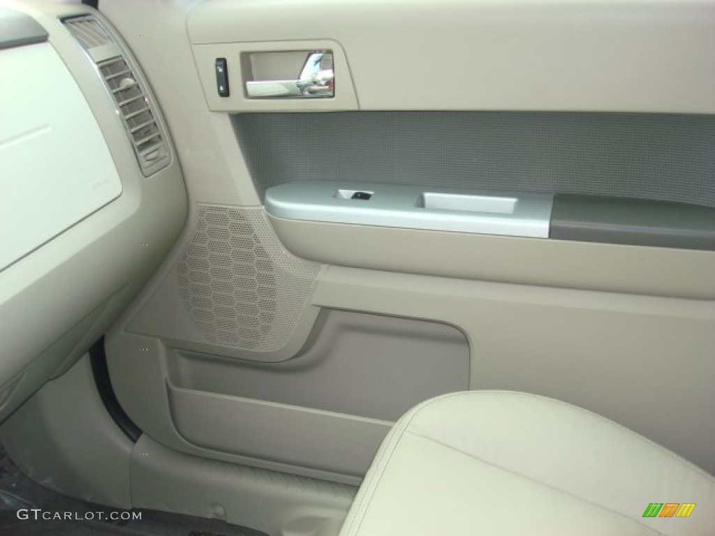 2010 Mariner V6 Premier 4WD - Sangria Red Metallic / Stone photo #21