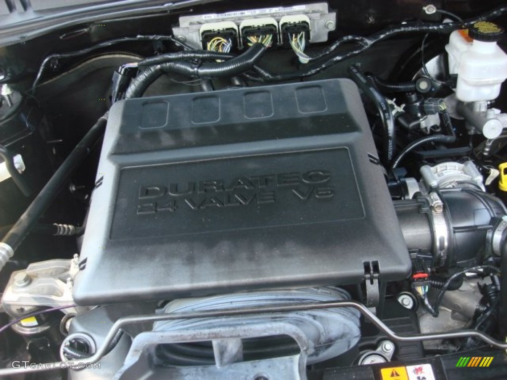 2010 Mariner V6 Premier 4WD - Sangria Red Metallic / Stone photo #28