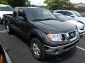 2010 Super Black Nissan Frontier SE V6 King Cab 4x4  photo #1