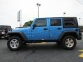 2010 Surf Blue Pearl Jeep Wrangler Unlimited Rubicon 4x4  photo #4