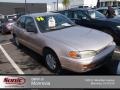 1996 Cashmere Beige Metallic Toyota Camry DX Sedan  photo #1