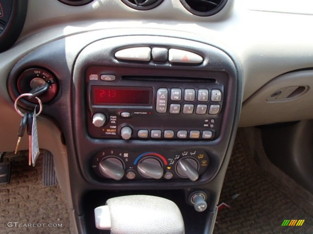 2001 Grand Am SE Coupe - Redfire Metallic / Dark Taupe photo #11