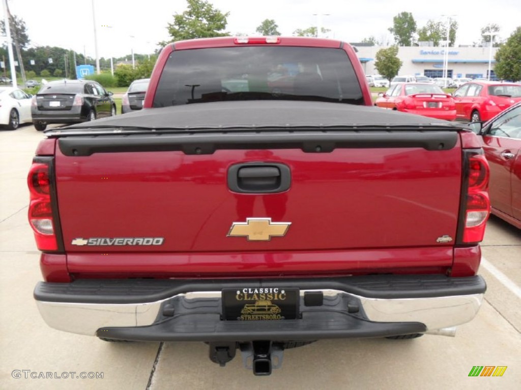 2006 Silverado 1500 LS Extended Cab 4x4 - Sport Red Metallic / Dark Charcoal photo #4