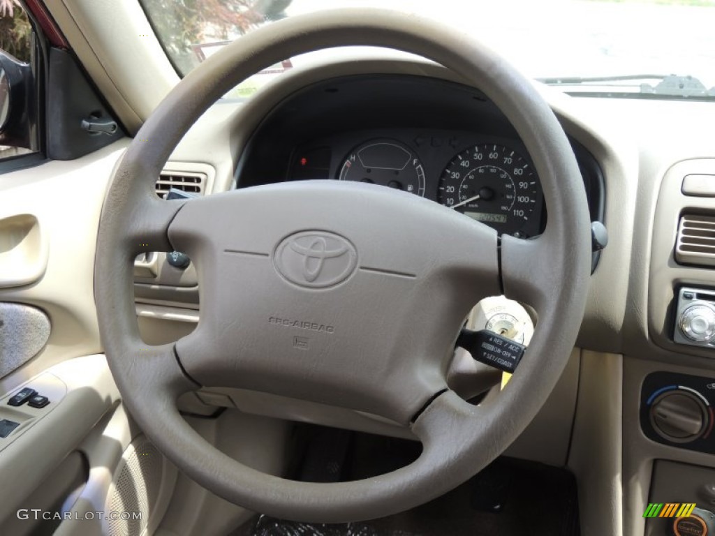 1999 Toyota Corolla LE Pebble Beige Steering Wheel Photo #83791660
