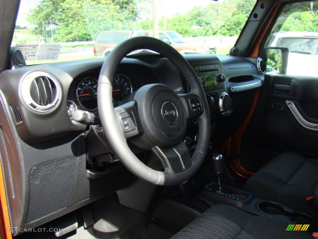 2011 Wrangler Sahara 4x4 - Mango Tango Pearl / Black photo #20