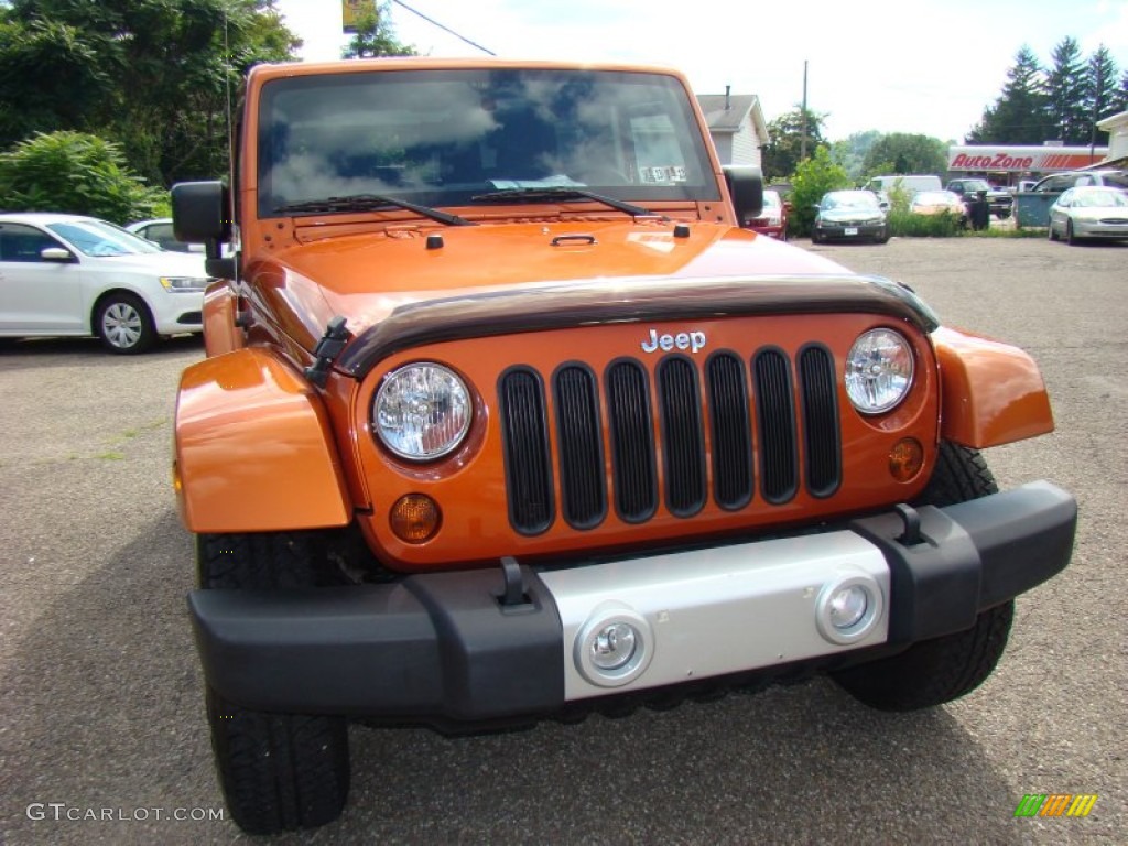 2011 Wrangler Sahara 4x4 - Mango Tango Pearl / Black photo #30